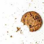 brown round cookie on white surface